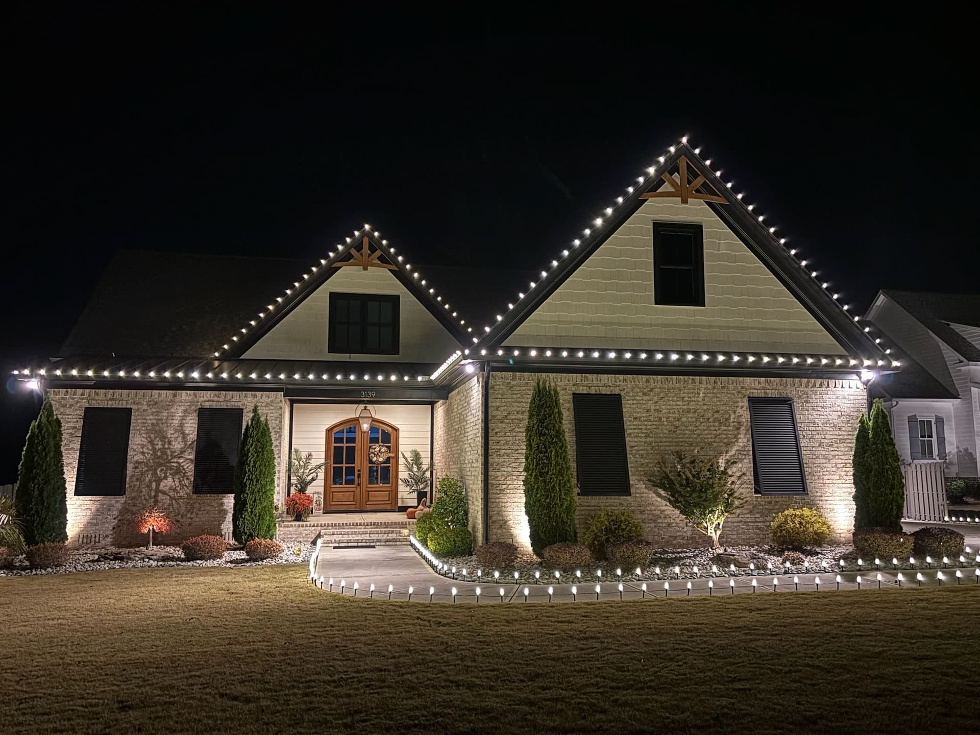 Holiday Lights Installation Brightens Up Local Neighborhood image